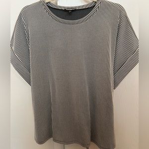 Express wide sleeve tee shirt. Tie on back.